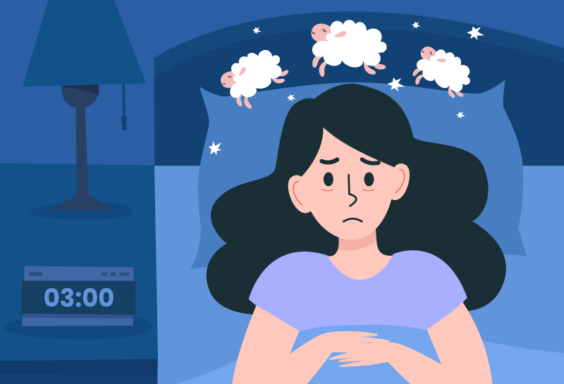 Woman experiencing insomnia and difficulty sleeping.
