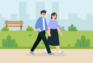 Couple in their 40s taking a brisk walk as a form of exercise.