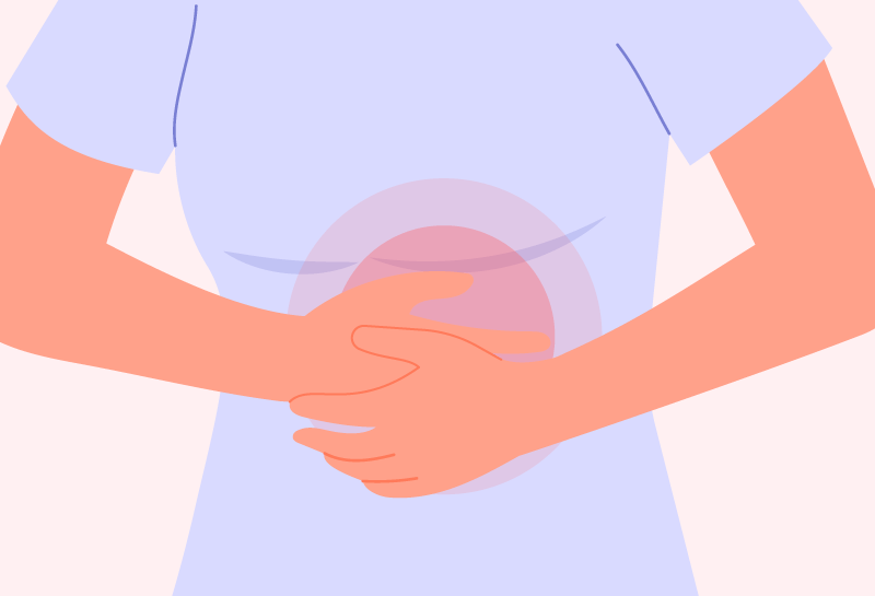 Woman dealing with ongoing stomach discomfort that may be caused by dyspepsia
