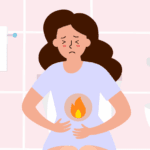 Woman showing symptoms of a urinary tract infection, such as burning while urinating.